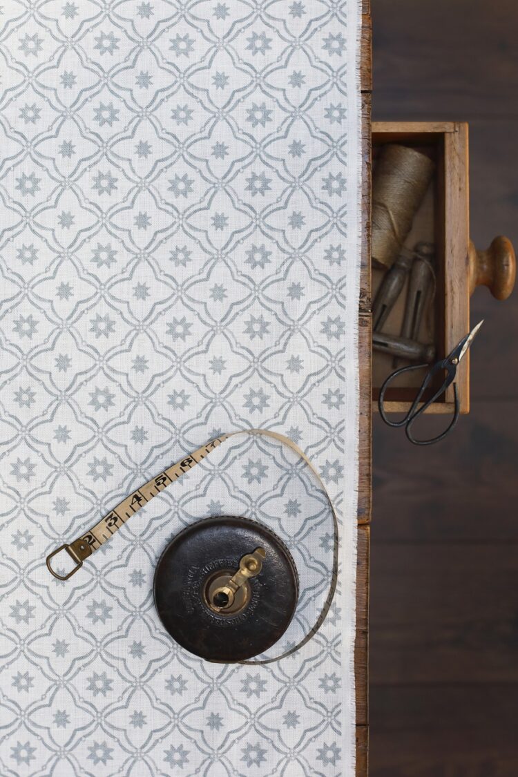 Bolonia Rain on Luxurious White Herringbone Linen