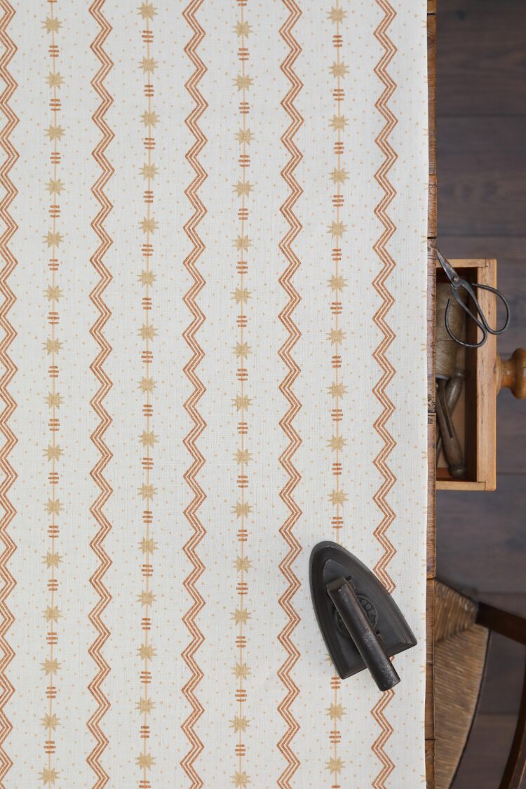 Tin Star (Small Scale) Terra on Double Cream Linen