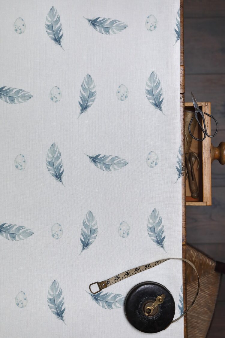 Bambrugh Feather and Egg in Bambrugh Blue on Ivory Linen