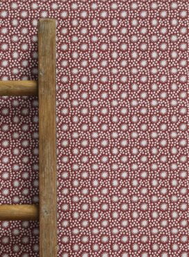 Tiny Sundance Maroon Background Wallpaper